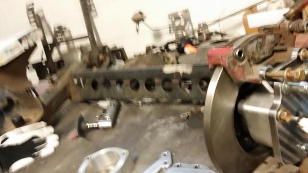axle beam, lowering roll center, adapting to corvette hubs