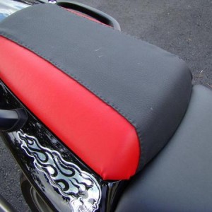 Hand made this out of red and black vynil. The stiching job i did by hand, and as you can tell I'm not that good at it, lol
