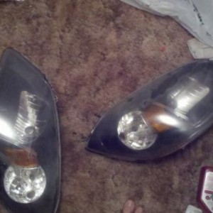 Passenger headlight wasreal bad inside of lens was destroyed. So did my best to clean them up. So forgot to put in turn cover. They are running white
