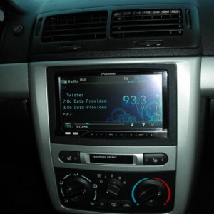 Pioneer indash receiver, running a 3000 watt Pioneer Premier Subwoofer, and soon to be running a set of Pioneer door speakers. I like pioneer equipmen