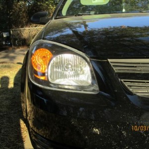 black satin rustoium on the chrome of the headlight housing