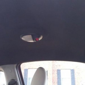 Blacked out headliner, visors, and dome light ring(w/ GM colormatched Victory Red switch)