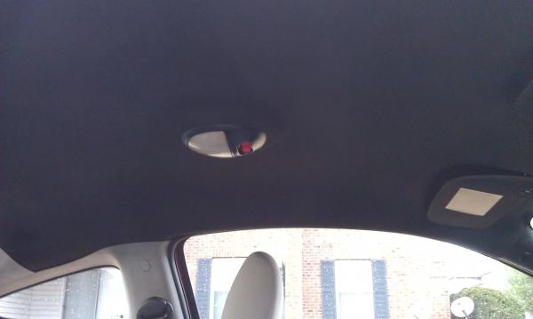 Blacked out headliner, visors, and dome light ring(w/ GM colormatched Victory Red switch)